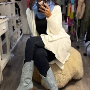 Cardigan largo tejido en tono off white